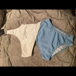 Blue and white one arm one piece